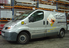 Flawless Flooring van. Contact Flawless Flooring for Laminate and Hardwood Flooring Supplies and Installation.